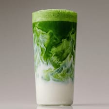 Matcha latte in a tall glass
