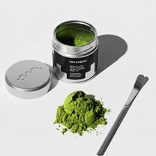 Open WHISK tin with matcha powder and scoop